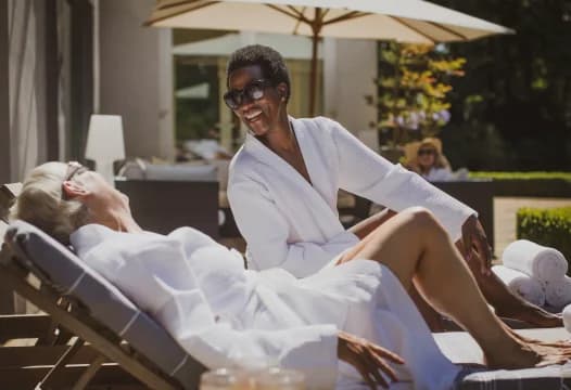 Women Relaxing Poolside